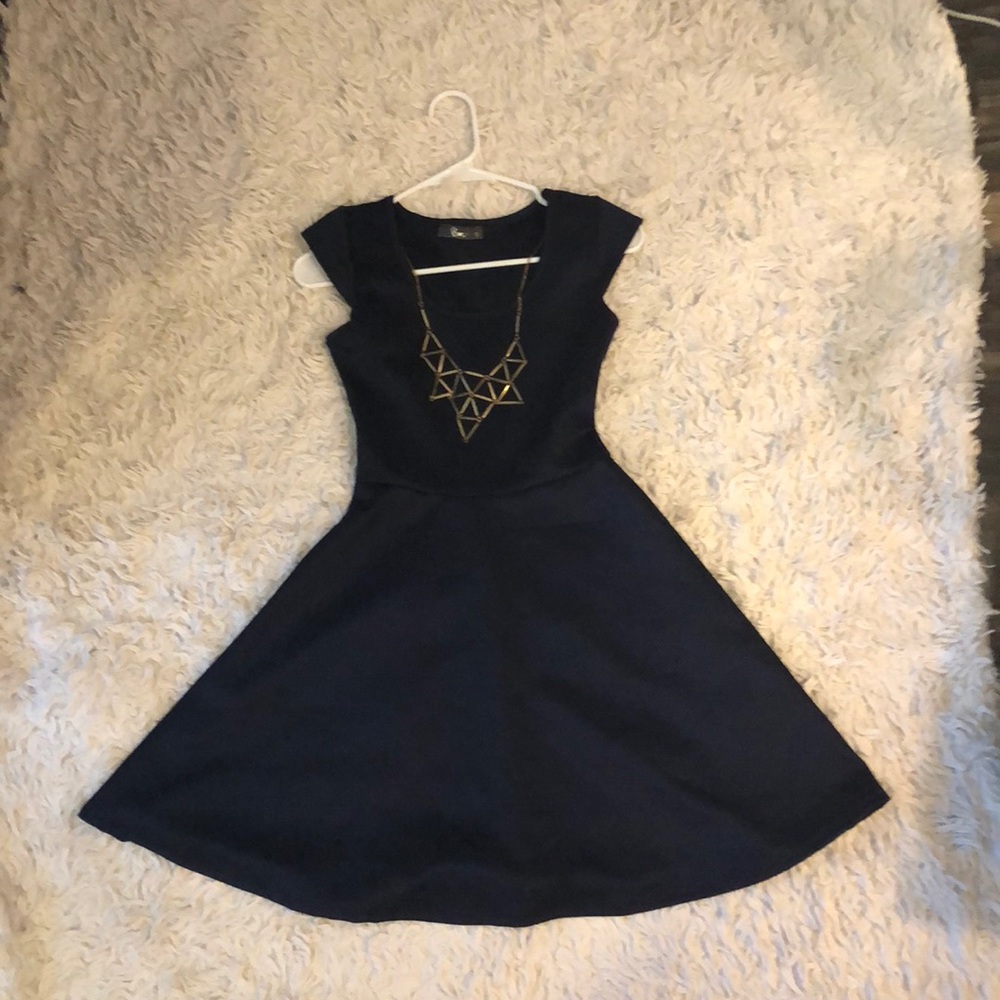 Dark Blue Dress with Gold Jewelry Attachment